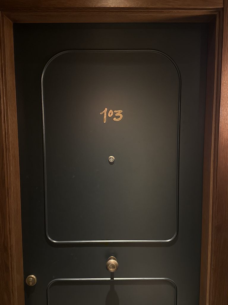 The Newman Hotel room door design